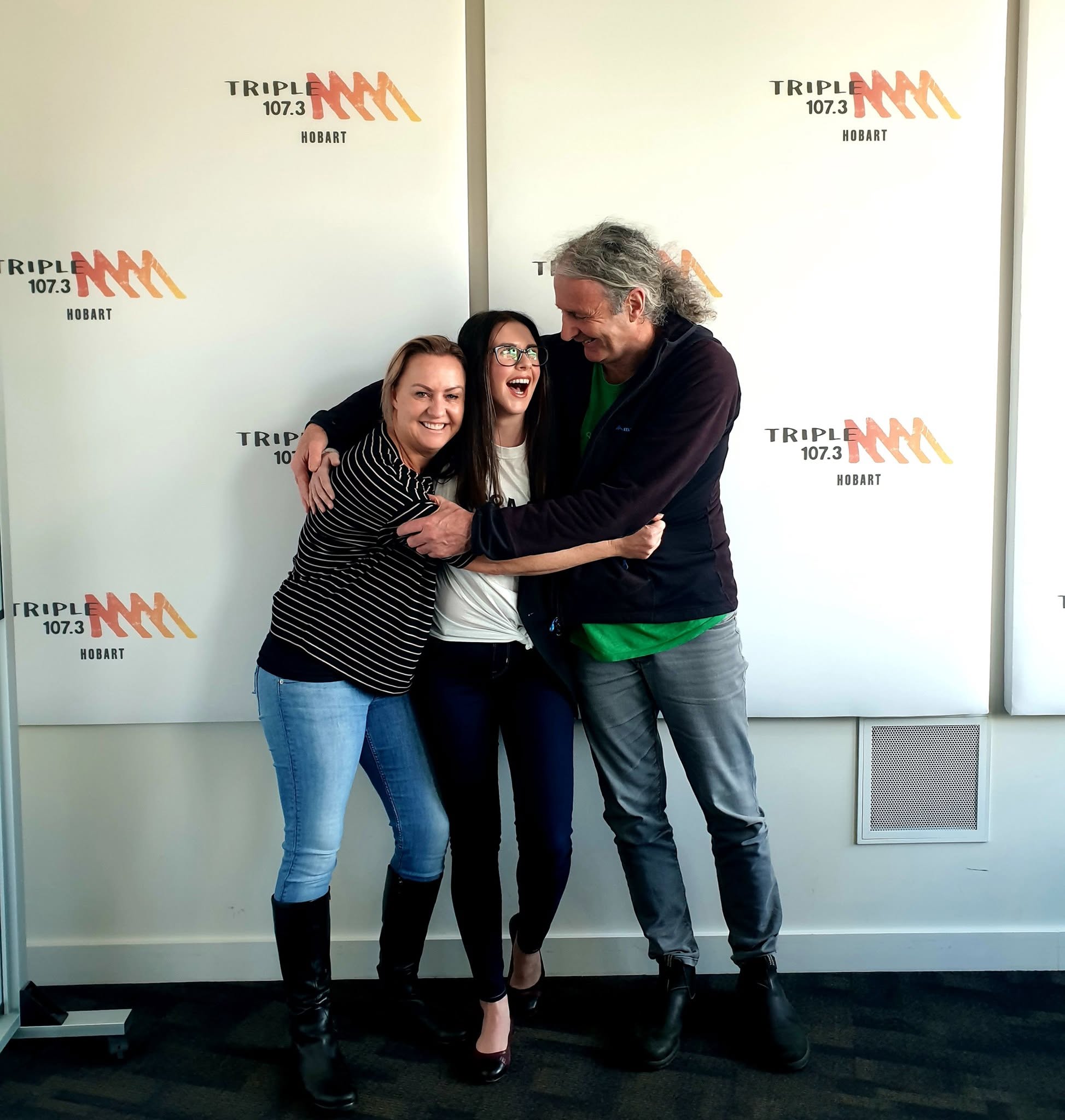 Alison Plath and Dave Noonan with a guest in the Triple M 107.3 Hobart studio