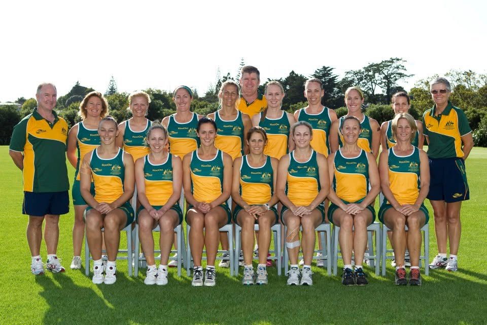 Alison Plath in the Australian touch football team photo, in green and gold